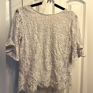 Lacy white flared sleeved small blouse